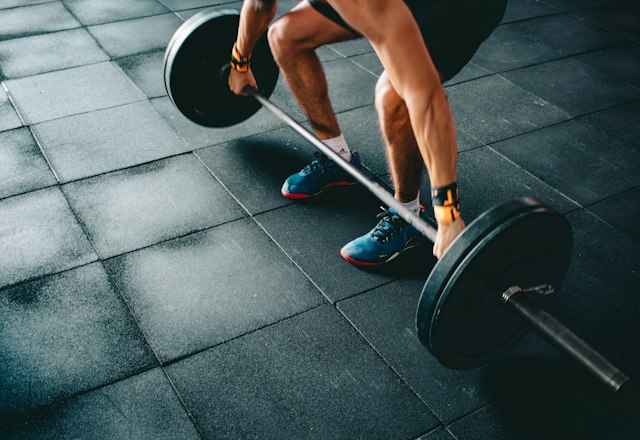 Lifter setting up for a barbell deadlift